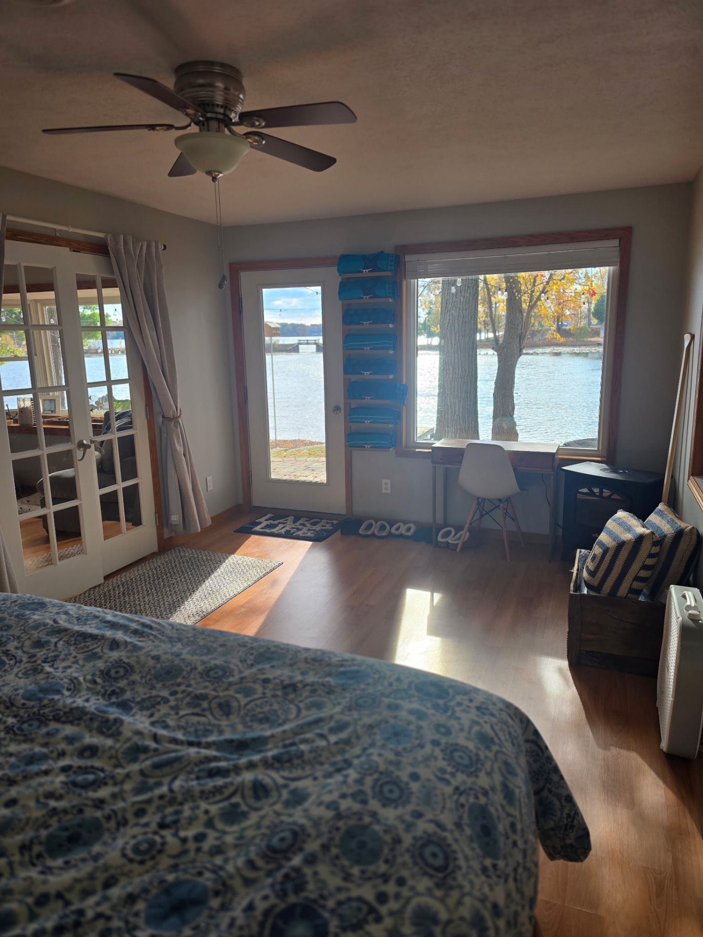 Lakefront bedroom with French doors